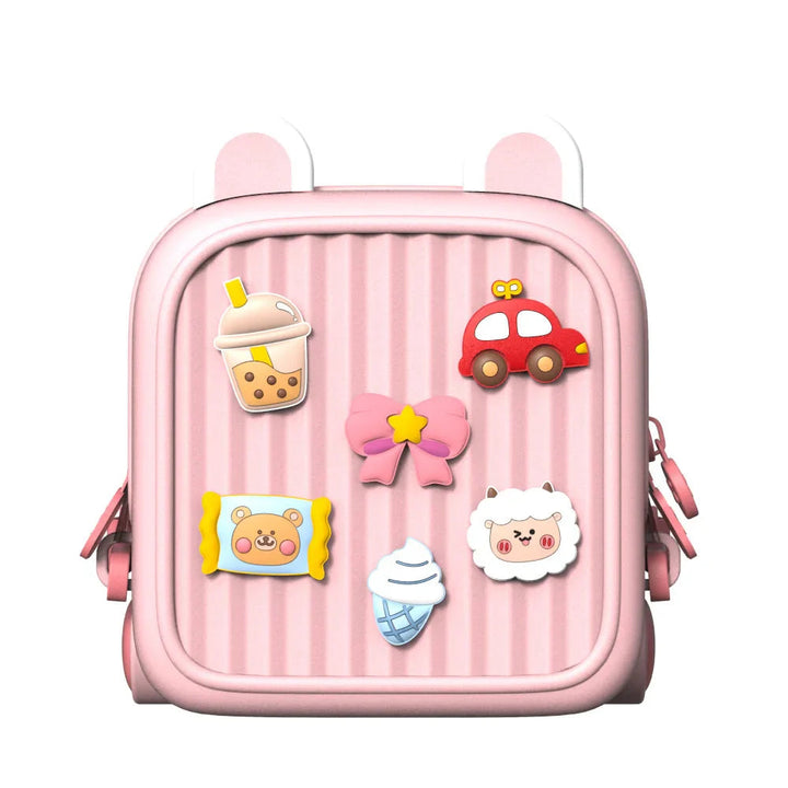 Pink backpack with rounded ear details and colorful raised decorations on the front