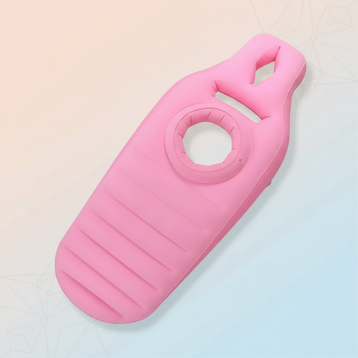 Pink inflatable pregnancy pillow with a central belly opening and ribbed lower section