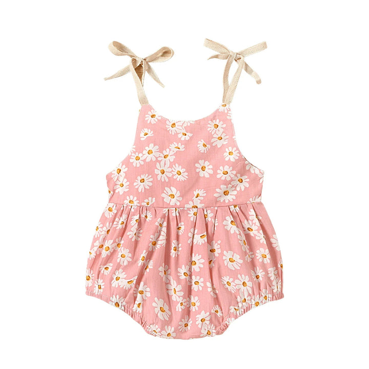 Pink baby romper with white flowers and a gathered waist