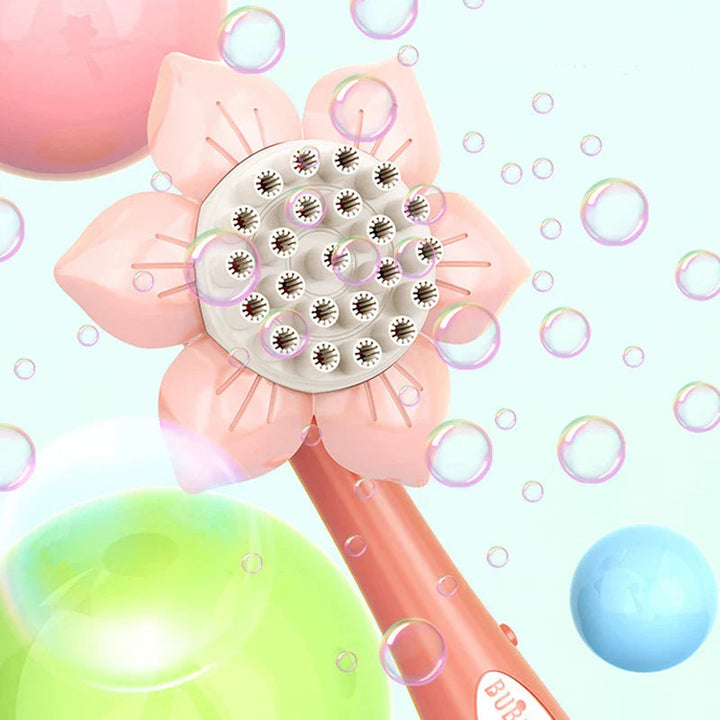Pink flower-shaped bubble blower showing the petal design and bubble openings