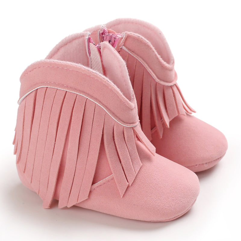 Pink fringe baby cowboy boots with curved ankle openings