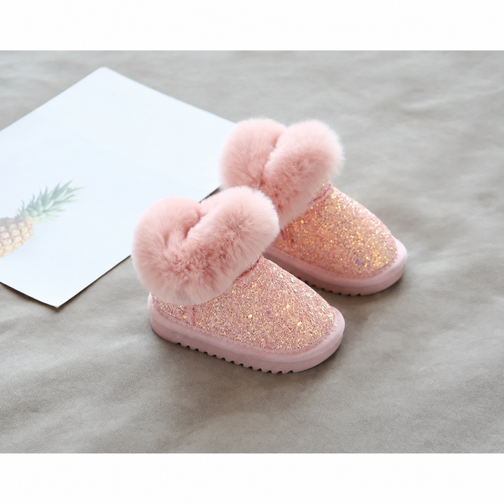 Pink glitter winter boots with fluffy pink cuffs and matching pink soles.