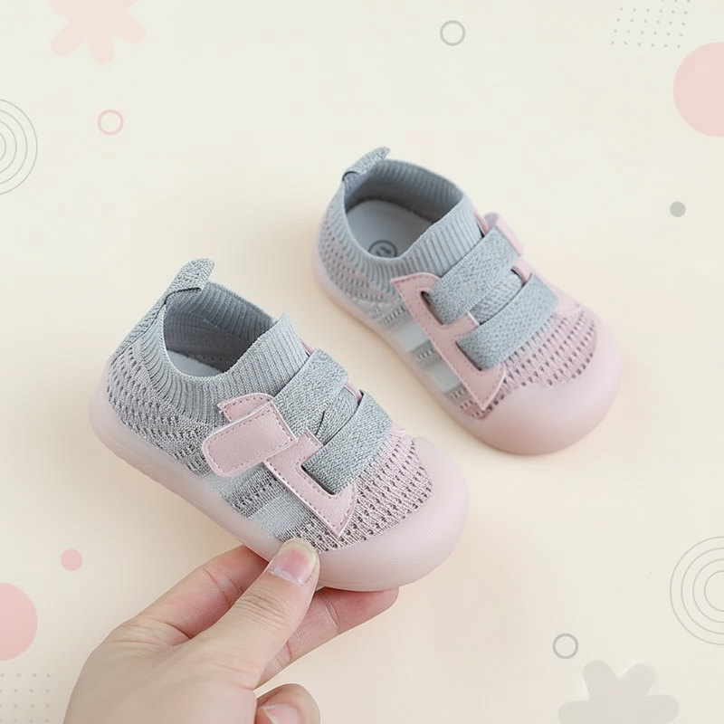 Pink baby shoes with gray mesh uppers and gray straps