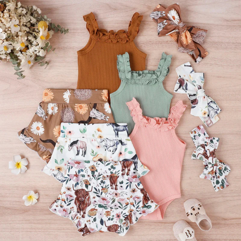 Pink, green and brown baby outfits with ruffle rompers, printed shorts and coordinating bow headbands