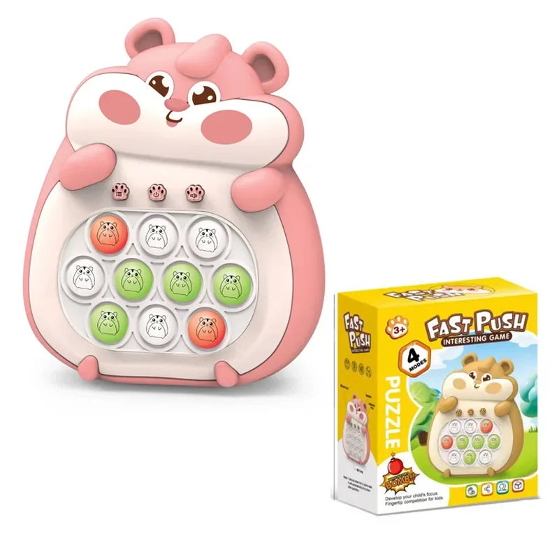 Pink hamster pop-button speed game beside its retail box