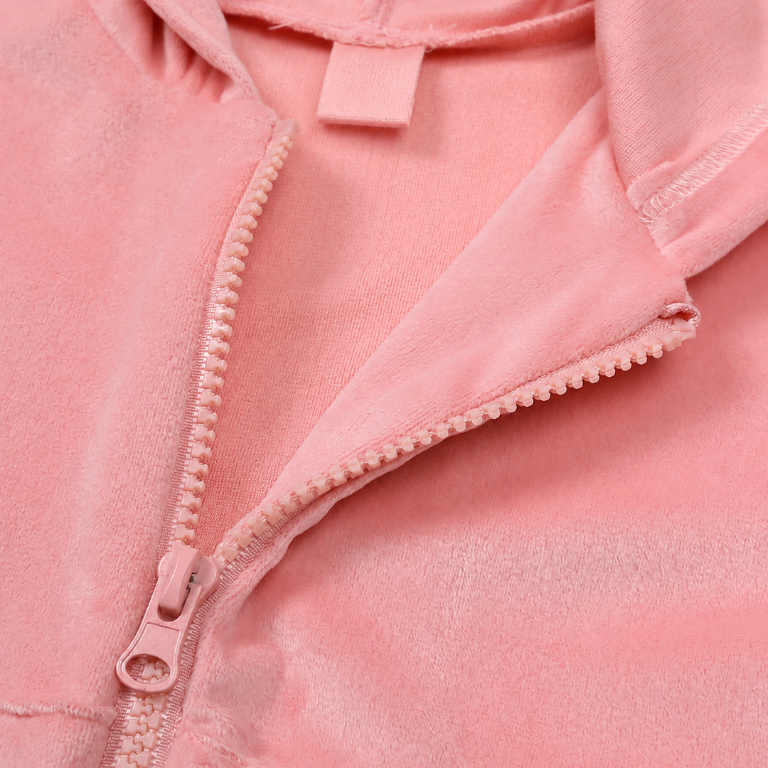 Front zipper and soft pink fabric on the hooded tracksuit jacket