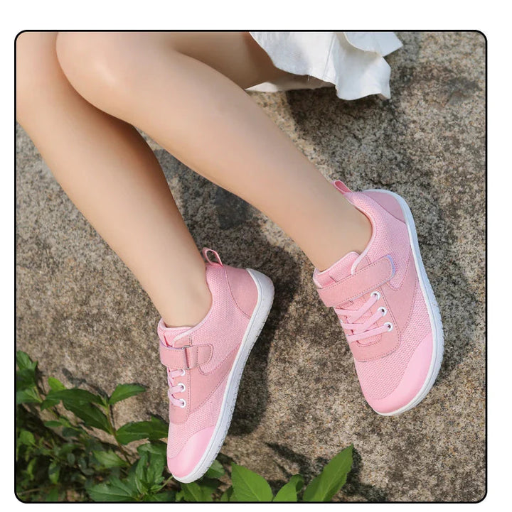 Child wearing pink kids&