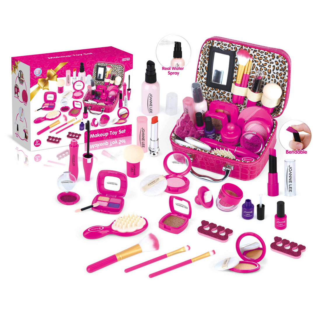 Pink makeup play set with an open carry case, toy cosmetics, brushes, and a product box