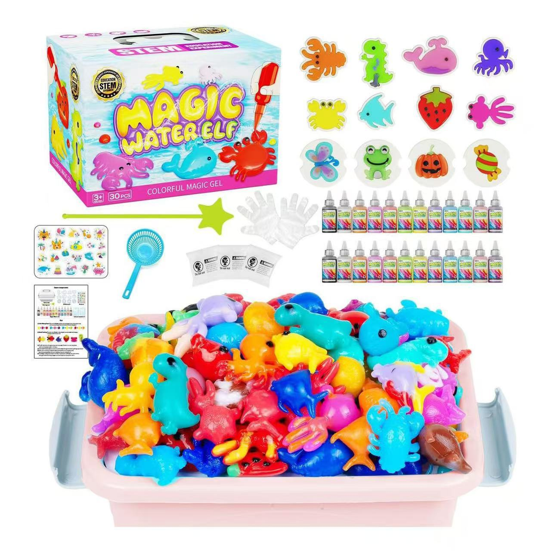 Pink craft box with colorful molded animals, shape molds, color bottles, and accessories