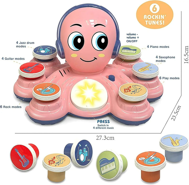 Pink octopus music toy measurement diagram with six removable musical inserts.