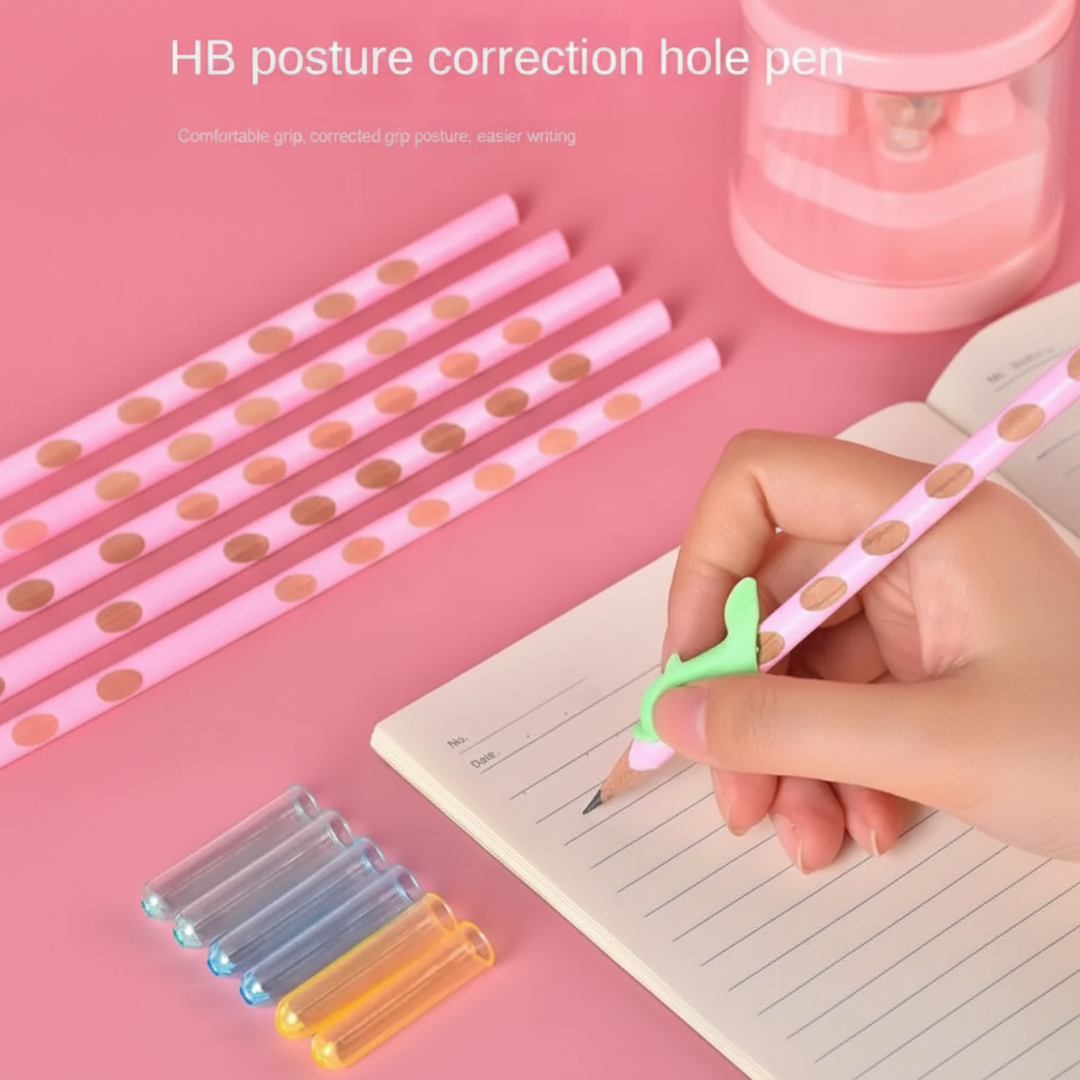 Pink pencil used with a green grip corrector during handwriting practice