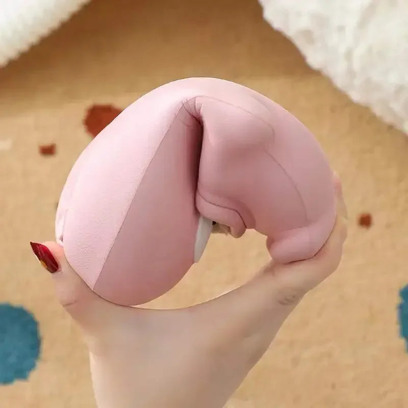 Pink EVA penguin slipper bent in one hand to show its flexible body