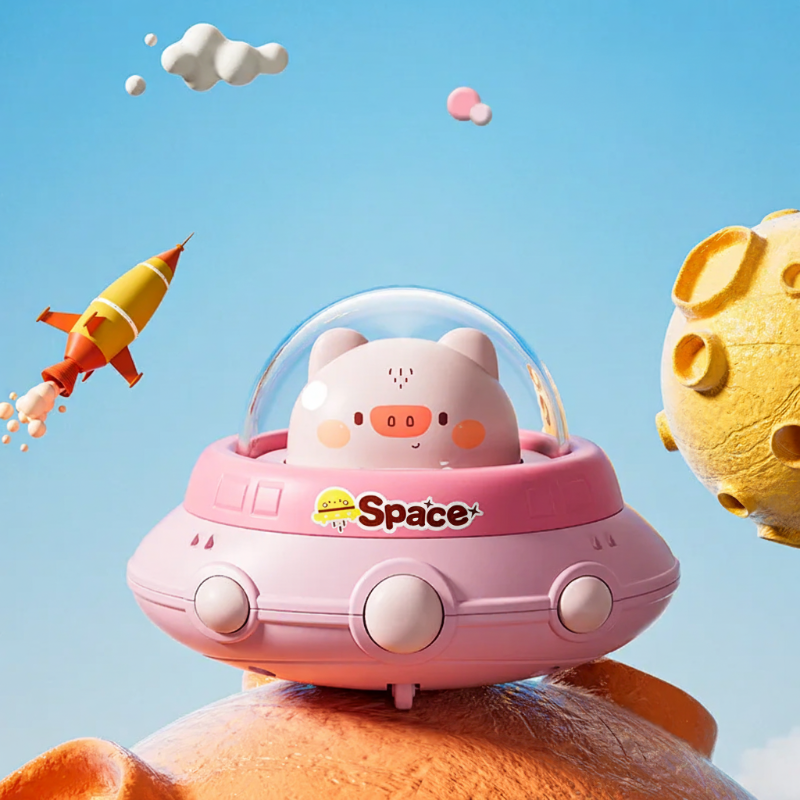 Pink pig UFO toy with a clear dome and round details around its pink body.