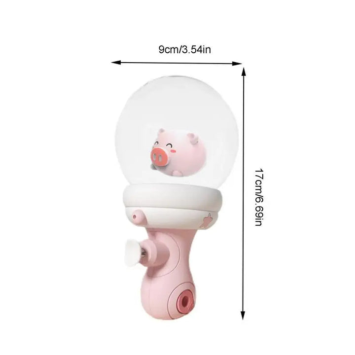 Pink pig water gun with measurements showing 17 cm height and 9 cm width