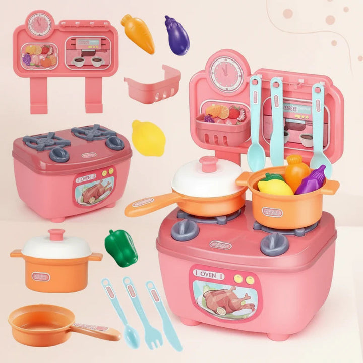 Pink kitchen set with separate base, back panel, cookware, utensils, and play vegetables