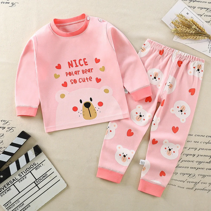 Pink polar bear pajama top with matching heart-and-bear print pants