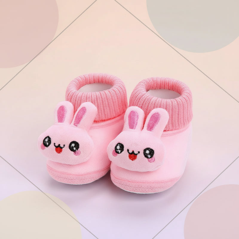 Pink rabbit baby slippers with long plush ears and ribbed collars