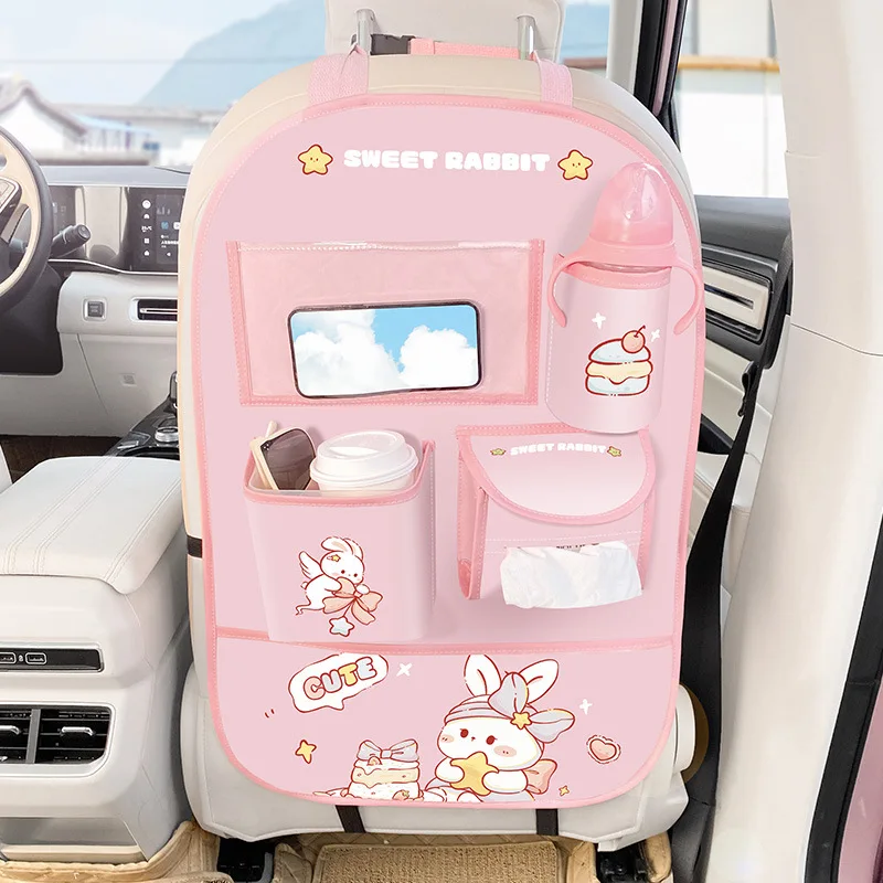 Pink rabbit backseat organizer holding a device, bottle, cup and tissues