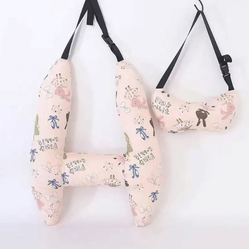 Pink rabbit-print H-shaped car pillow and matching neck pillow with black hanging straps