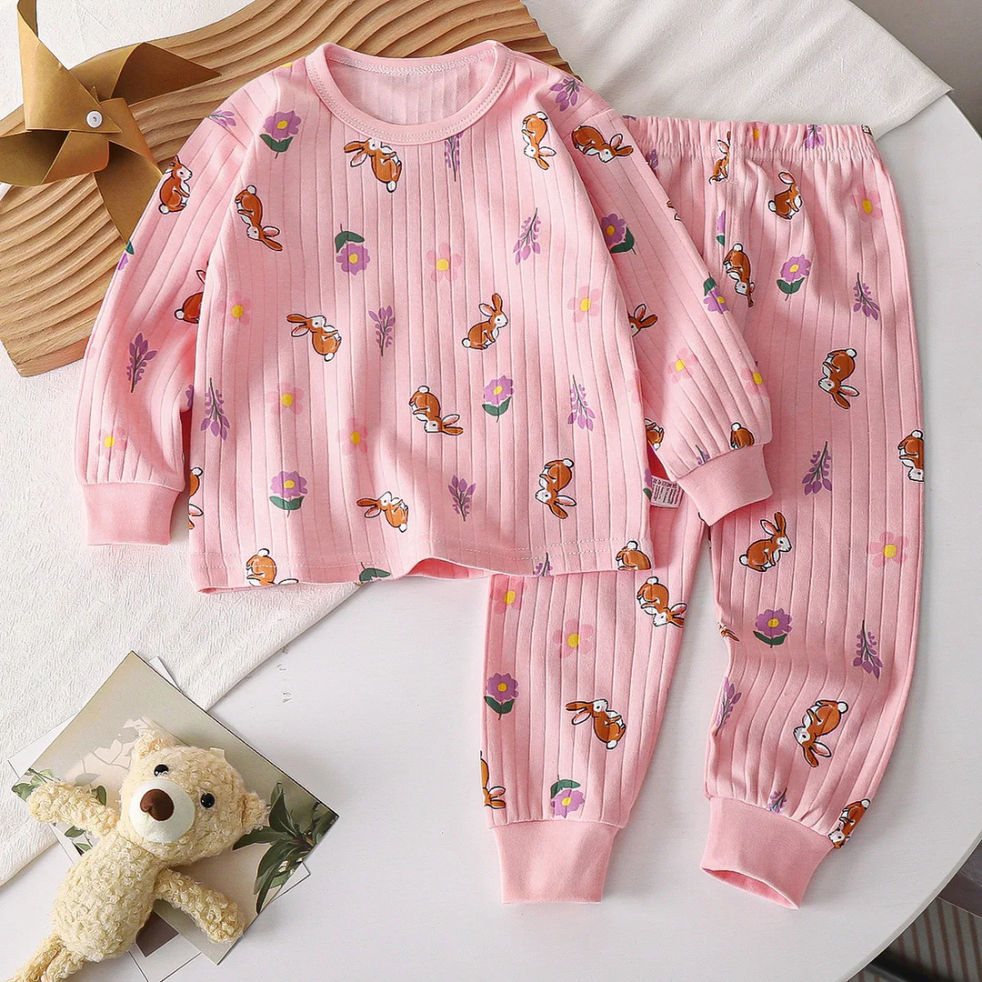 Pink rabbit-print pajama set with a long-sleeve top and matching pants