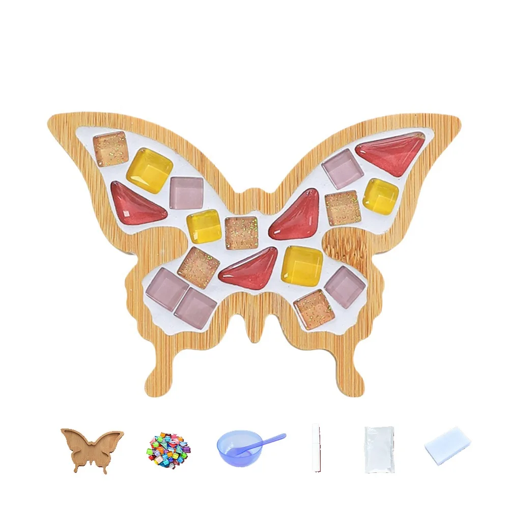 Pink, red and yellow butterfly mosaic coaster with bamboo base and crafting supplies