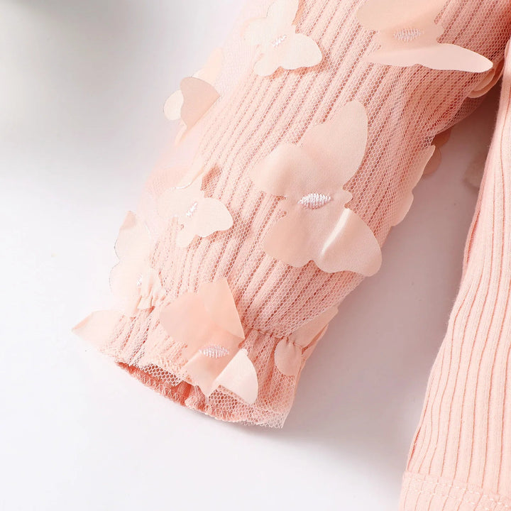 Raised pink butterfly accents on the romper&