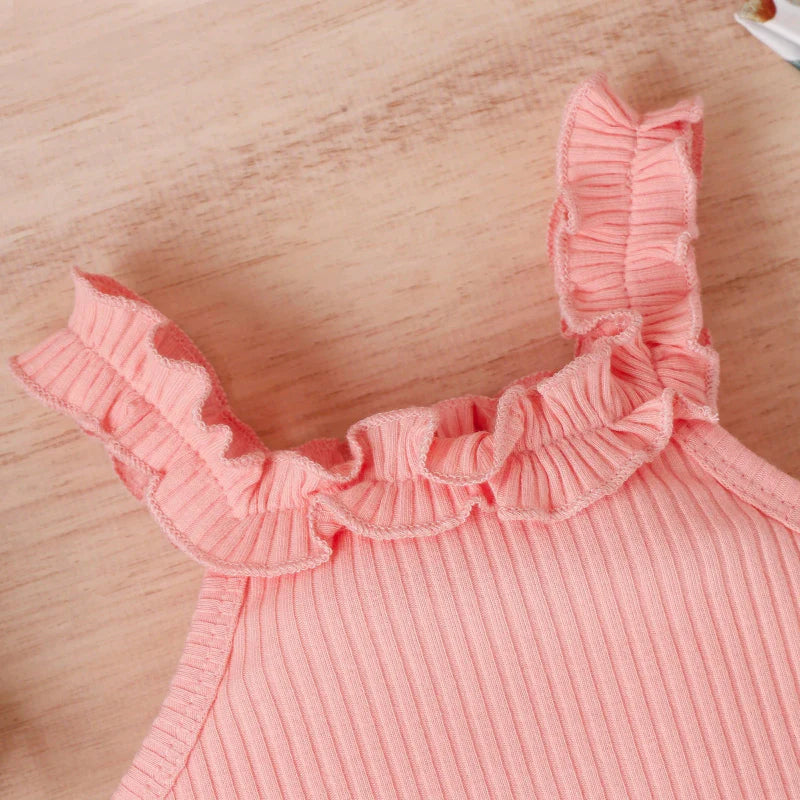 Close-up of the pink romper&