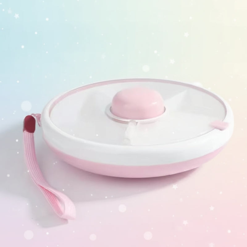 Pink round snack box with a clear lid, center button, and matching wrist strap