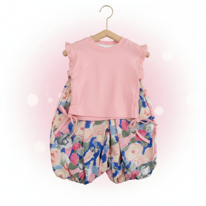 Pink ruffle-trimmed sleeveless top with multicolored printed pants