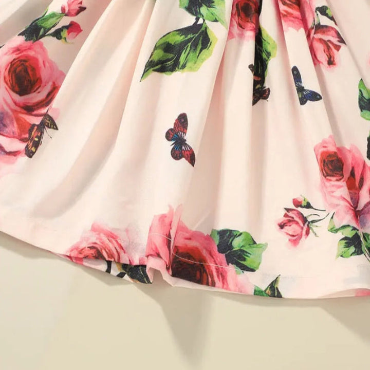 Rose and butterfly print on the pink dress&