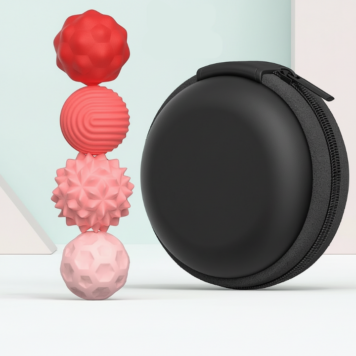 Four small pink and red textured magnetic beads beside a round black zippered case