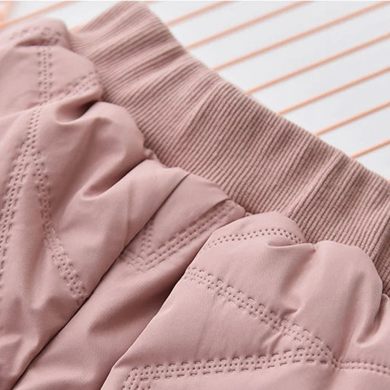 Close-up of the pink snow pants&