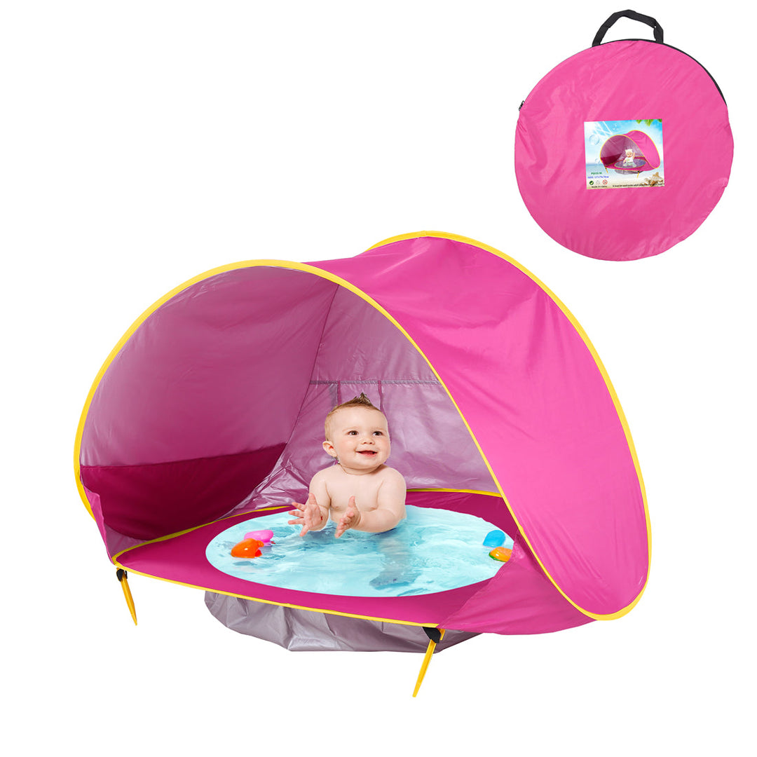Pink pop-up tent with a baby in the built-in bath and a matching carrying bag