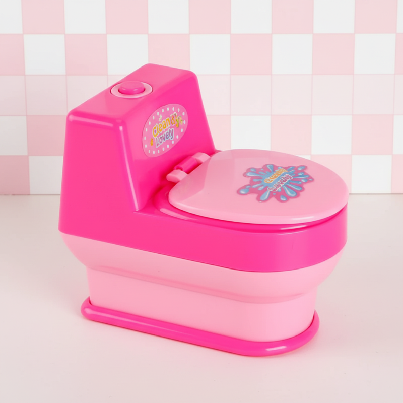 Pink toy toilet with a closed lid and button on the tank