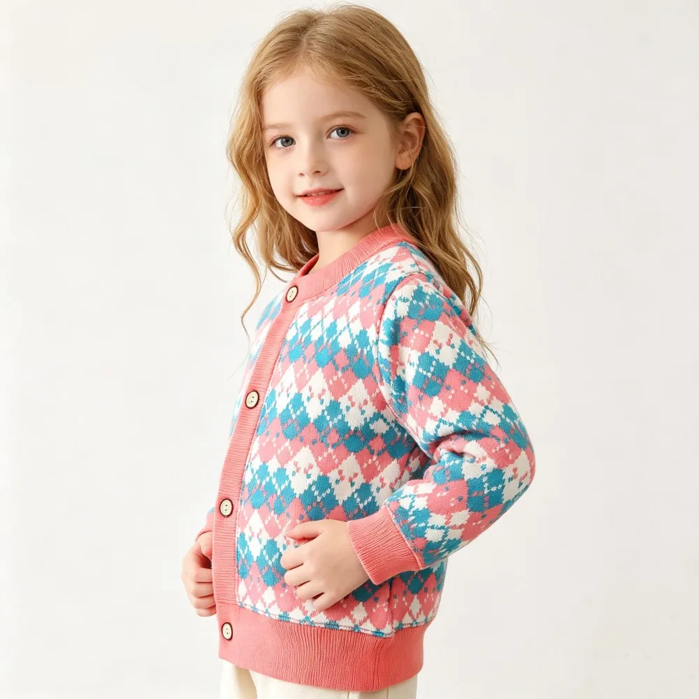 Side view of a pink and turquoise diamond-pattern cardigan with a pink button front