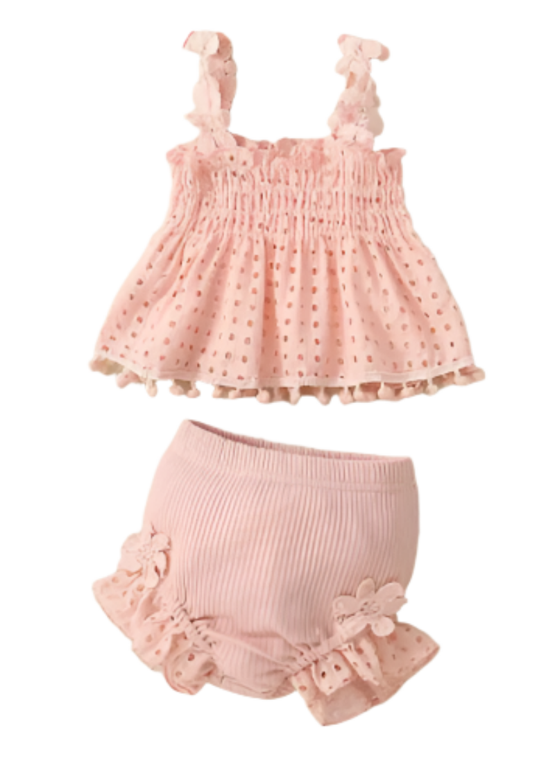 Pink baby top and shorts set with floral straps and ruffled leg openings
