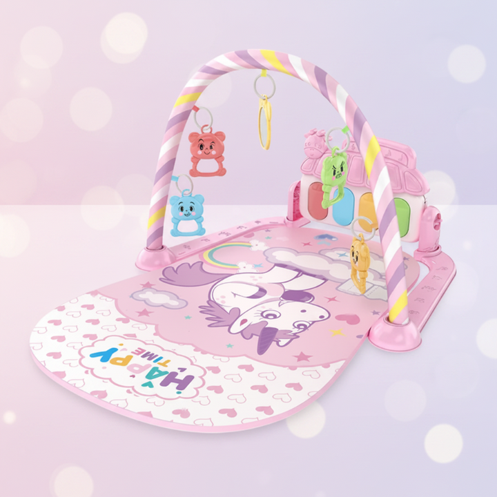 Pink unicorn-print baby play gym with a pastel arch and four colorful hanging rattles