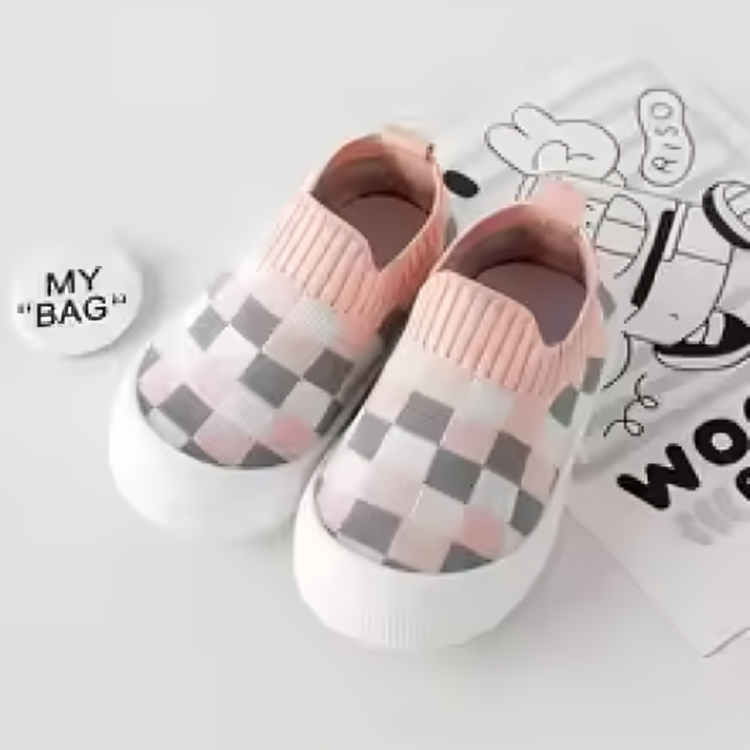 Pink, white, and gray checkered slip-on shoes with ribbed pink openings