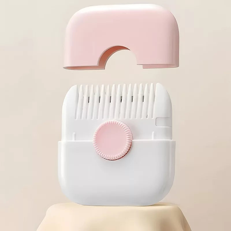 Pink and white hair trimmer with its pink cover removed to reveal the comb teeth