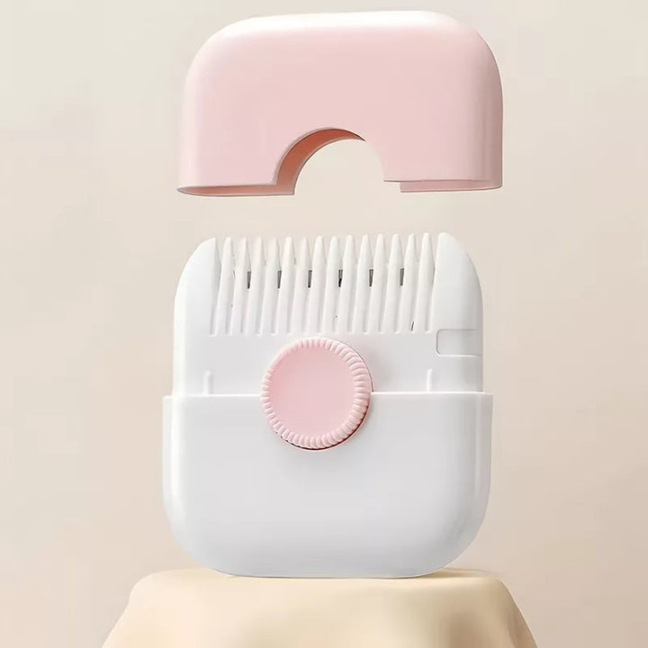Pink and white hair trimmer with its pink cover removed to reveal the comb teeth