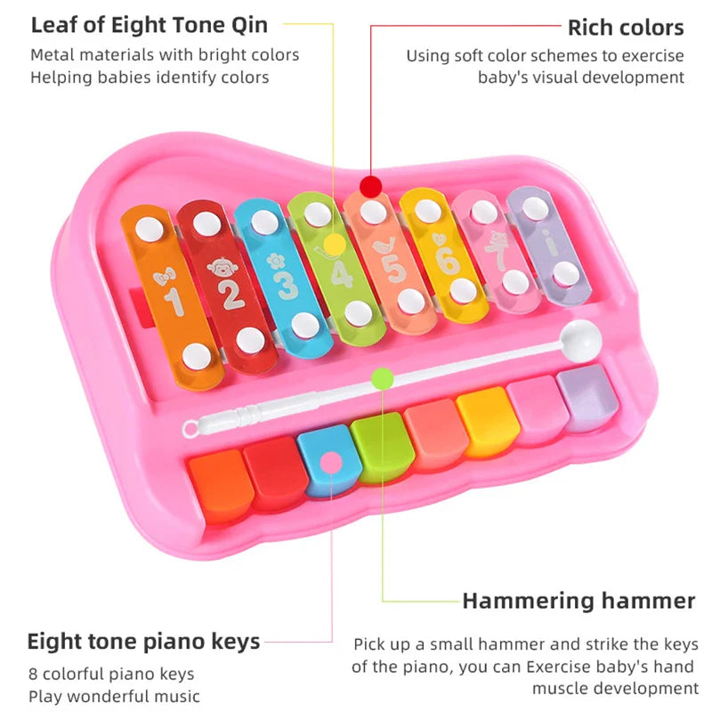 Pink xylophone and piano toy with eight colored bars, matching keys, and a white mallet