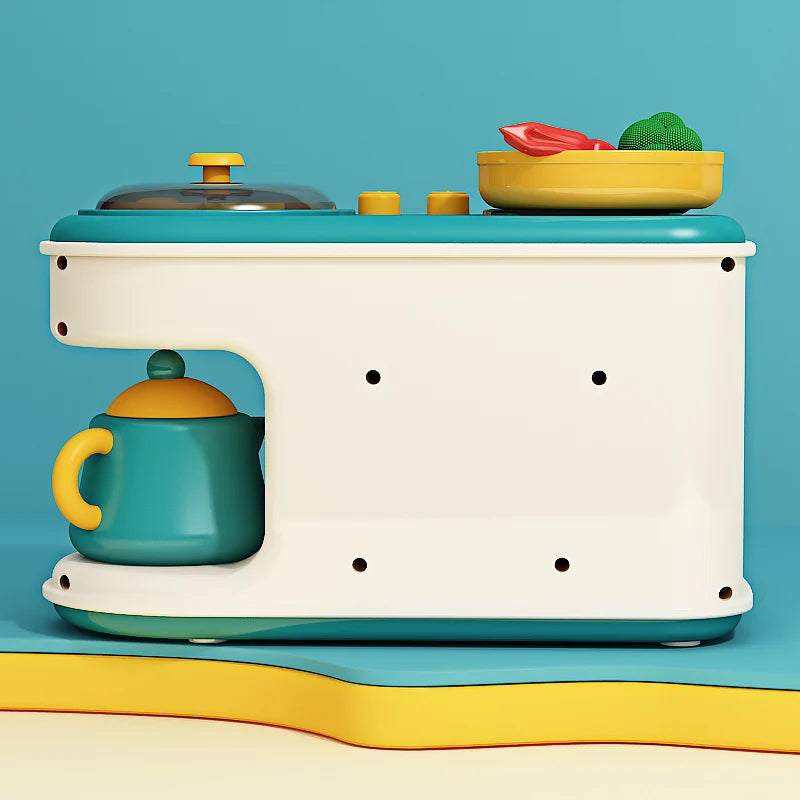 Rear view of the cream-and-teal play kitchen with a yellow pan and a kettle