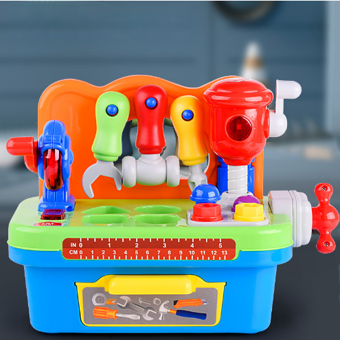Toy workbench with hanging tools above a green worktop and a yellow handle on the blue base