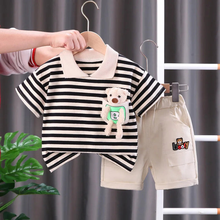 Black-and-cream striped short-sleeve T-shirt with a bear accent and beige shorts
