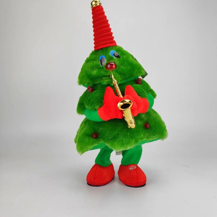 Green plush Christmas tree toy holding a gold-colored saxophone.