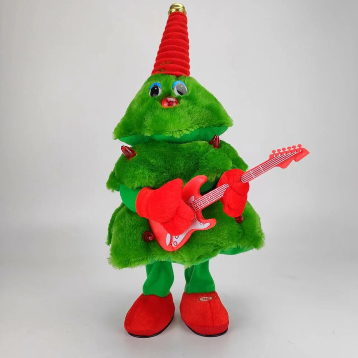 Green plush Christmas tree toy holding a red guitar.