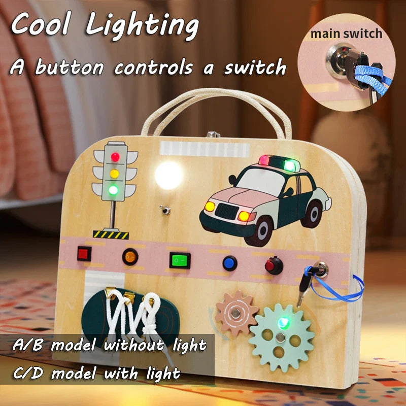 Police car busy board with illuminated LEDs, colored switches, gears, laces, and a key switch.