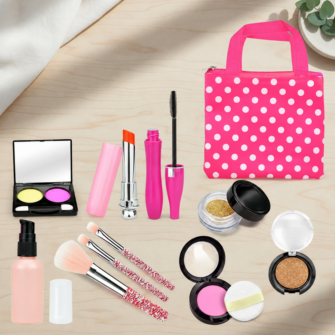 Pretend makeup accessories and brushes arranged beside a pink polka-dot tote
