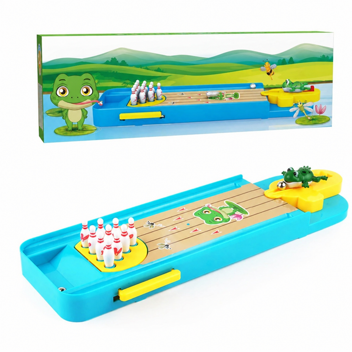 Tabletop bowling game beside its box, with a turquoise lane and yellow frog launcher