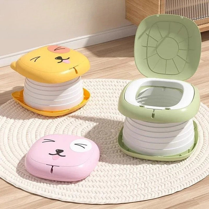 Green and yellow portable potties shown expanded beside a folded pink potty